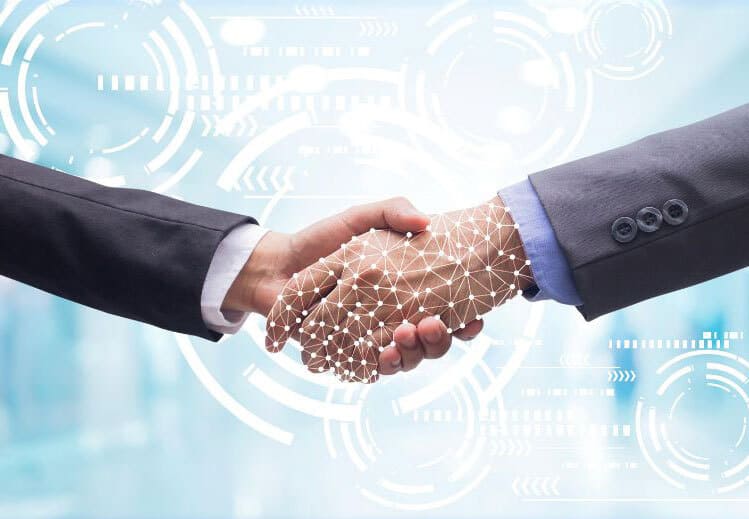 Digital business handshake with technology overlay